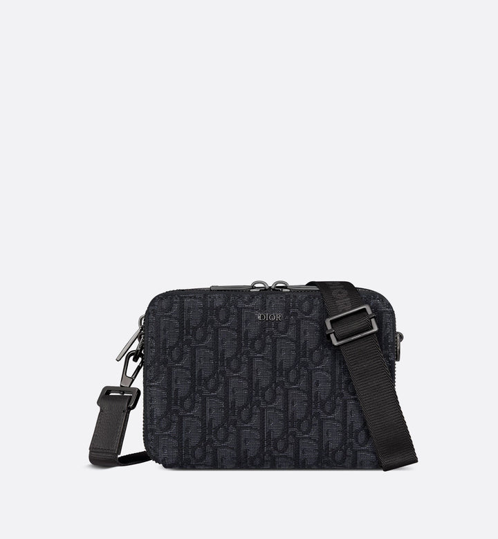 Pouch with zipper and strap