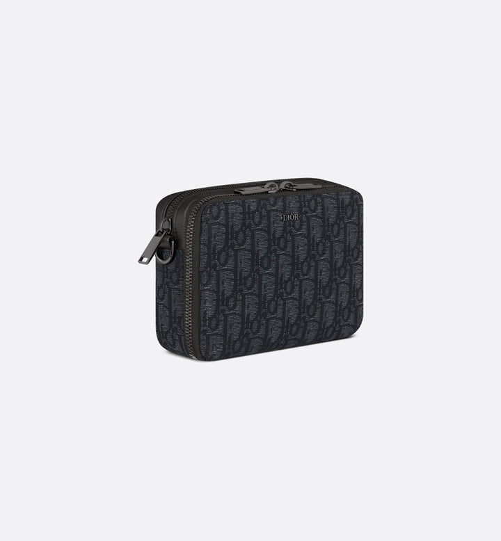 Pouch with zipper and strap