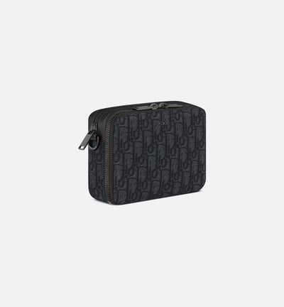 Pouch with zipper and strap