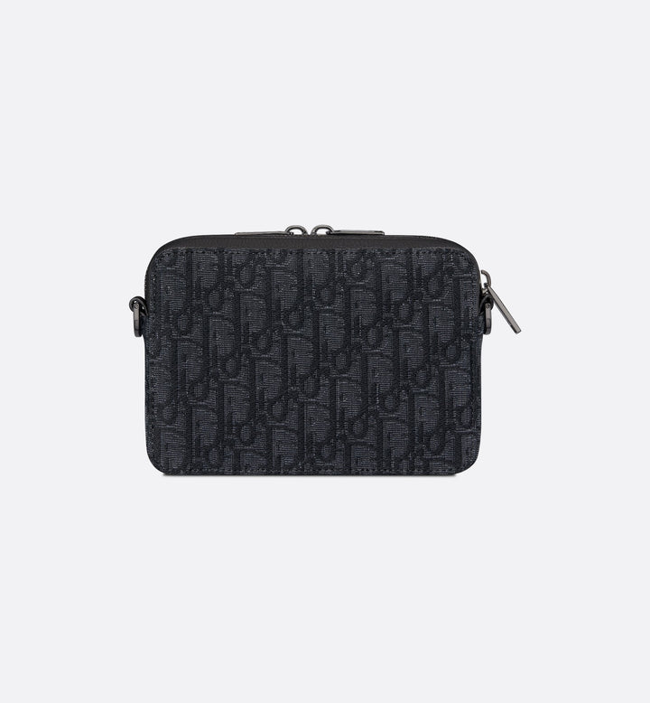 Pouch with zipper and strap