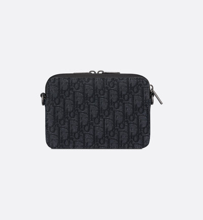 Pouch with zipper and strap