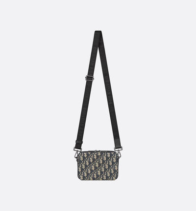 Pouch with zipper and strap