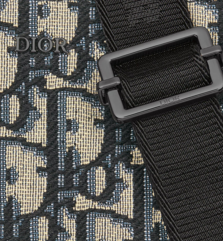 Pouch with zipper and strap