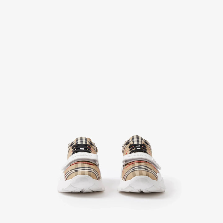 Sneakers made from check fabric, suede and leather
