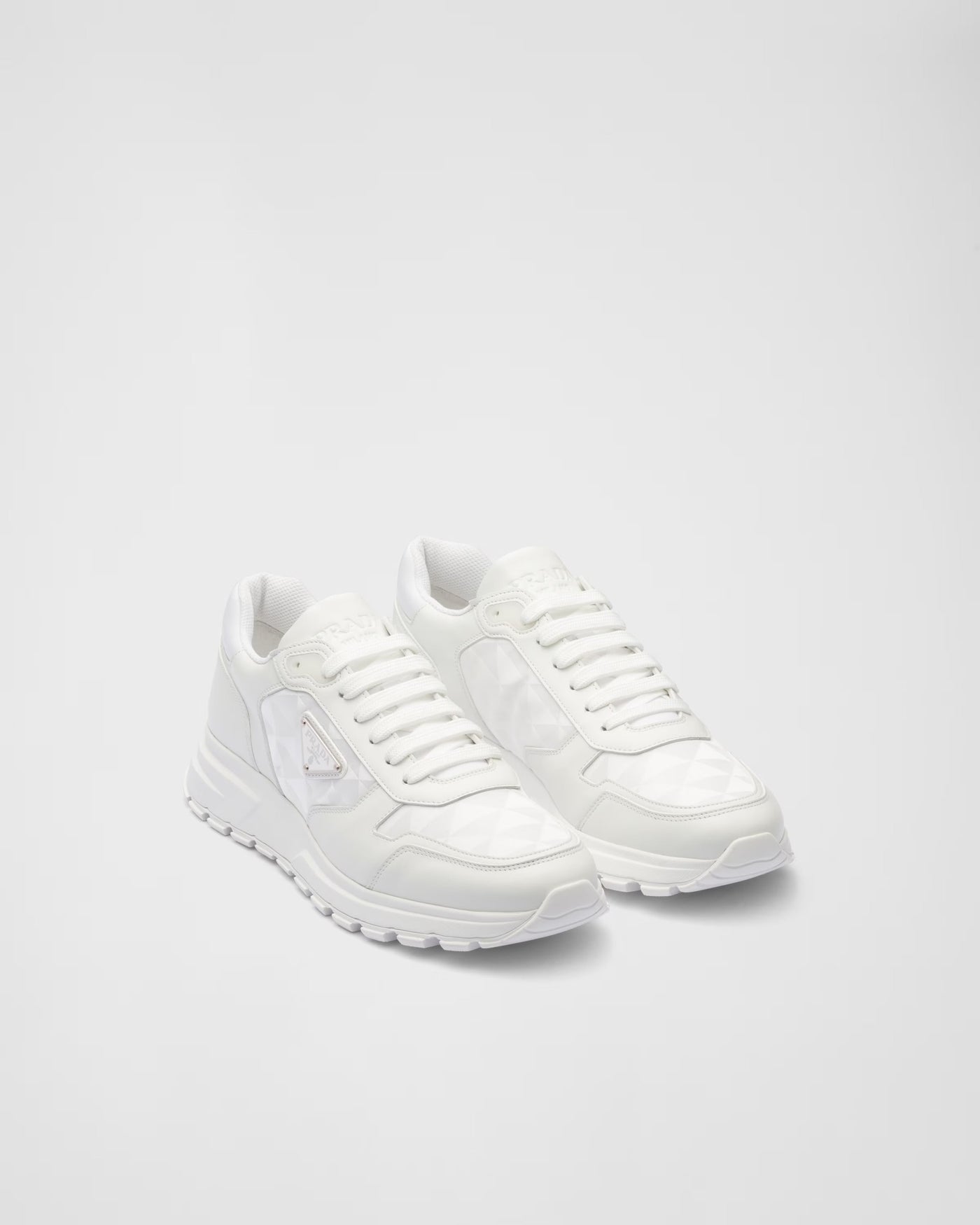 High-top sneaker made from leather and re-nylon