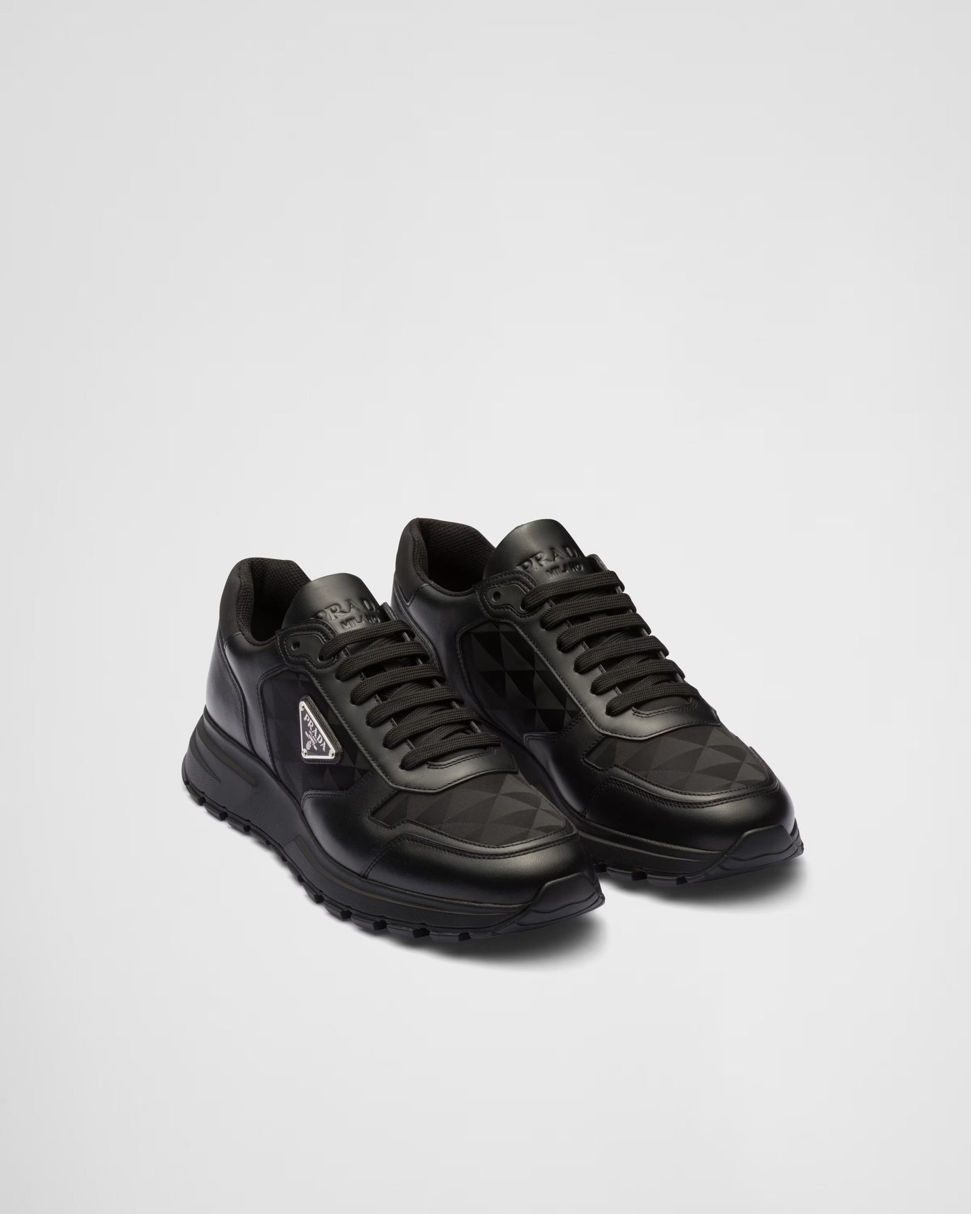 High-top sneaker made from leather and re-nylon